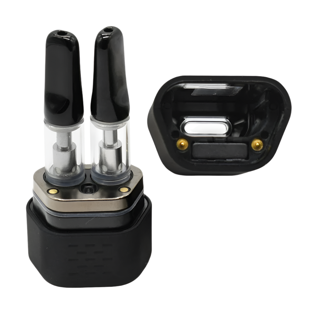 A detailed view of the Honeystick Duo's magnetic base with dual 510 thread cartridge slots, revealing the interior connections.