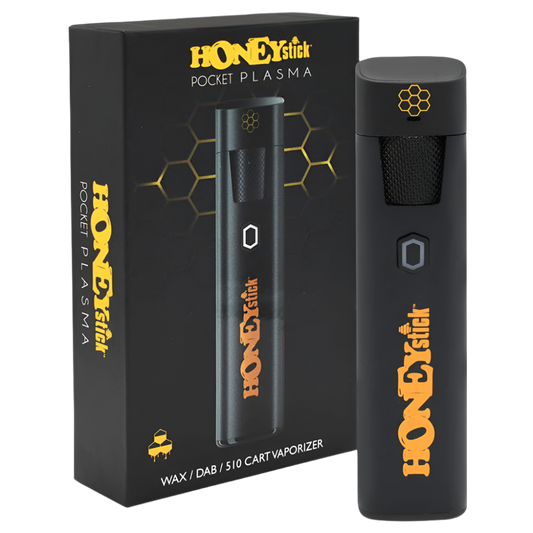 A black Honeystick Pocket Plasma vaporizer standing next to its packaging, featuring a honeycomb design and orange branding.