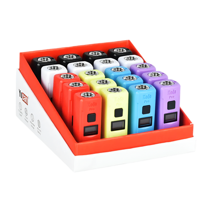A display box containing 20 Yocan Kodo Pro digital 510 batteries in various colors, including red, black, white, yellow, blue, and purple.